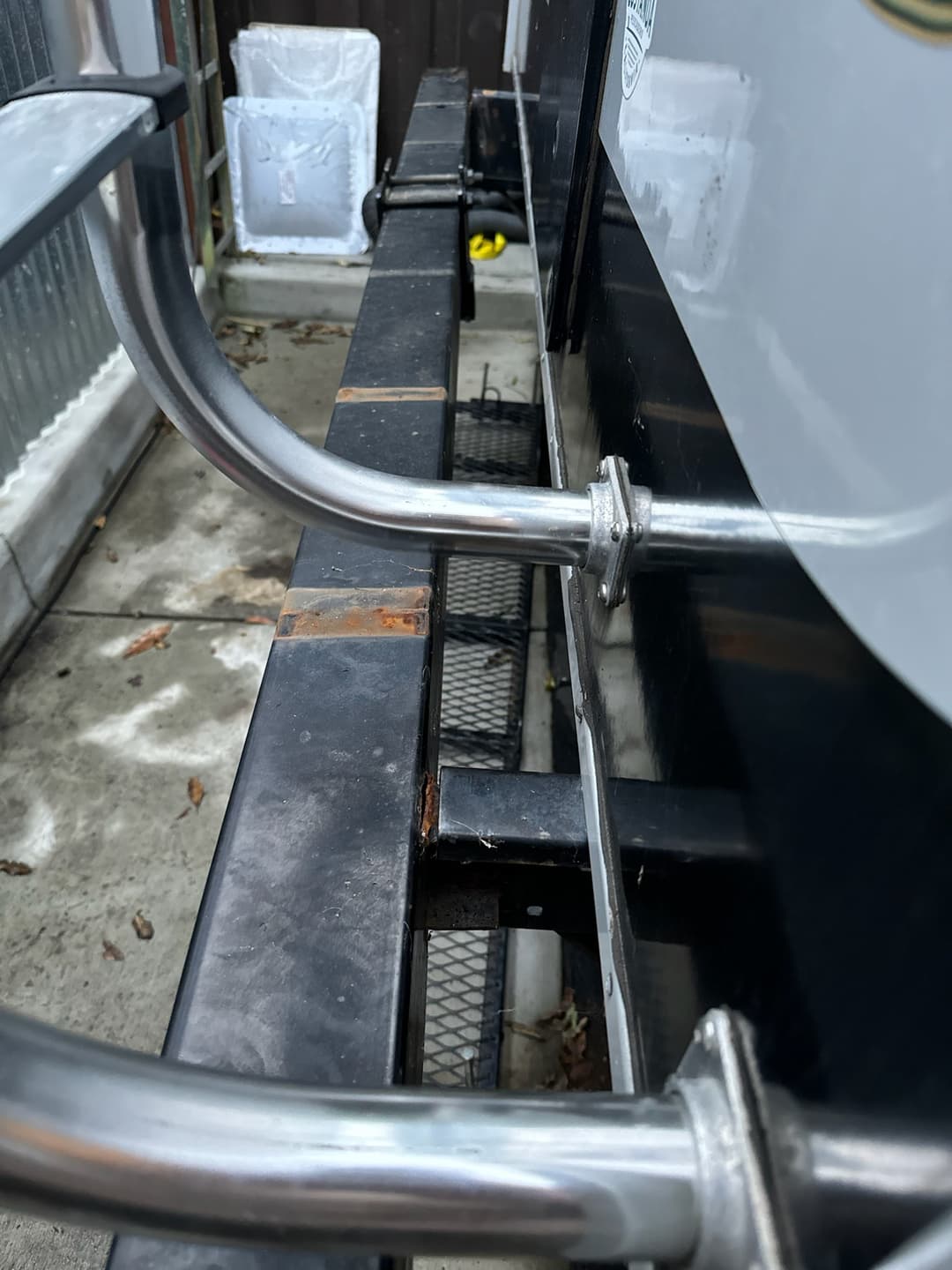 picture of a welded piece of metal connected to an RV