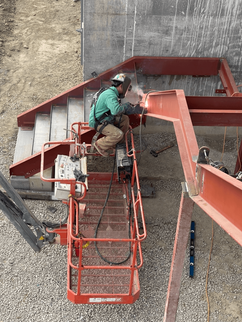 Welder fabricating a commercial metal staircase in Santa Cruz, CA